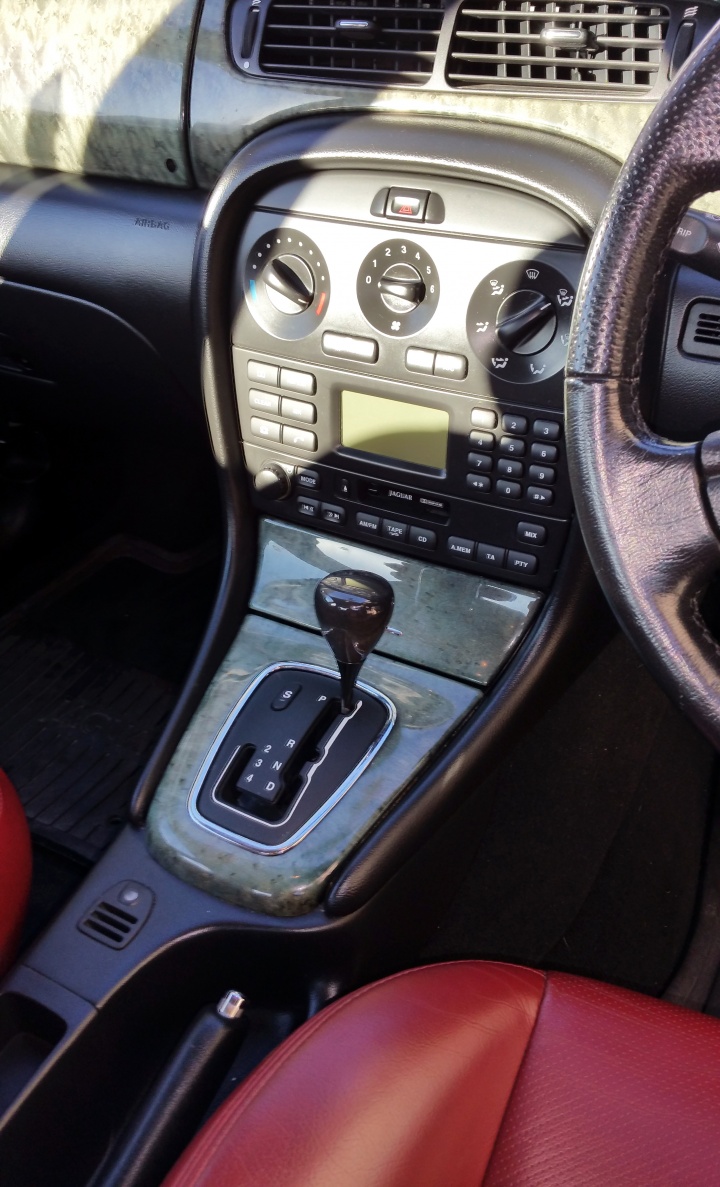 First viewing inside the X. Lovely cranberry leather but that cassette/radio has to go! First viewing inside the X. Lovely cranberry leather but that cassette/radio has to go!